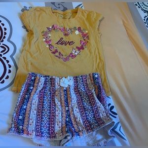 Carters outfit both shirt and shorts are size 5-6